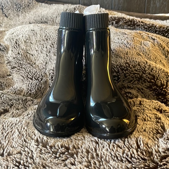 Never been worn , still in wrapping/box Coach rain boots